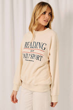 Load image into Gallery viewer, CREW NECK LONG SLEEVE "READING IS MY DAILY SPORT" SWEATSHIRT
